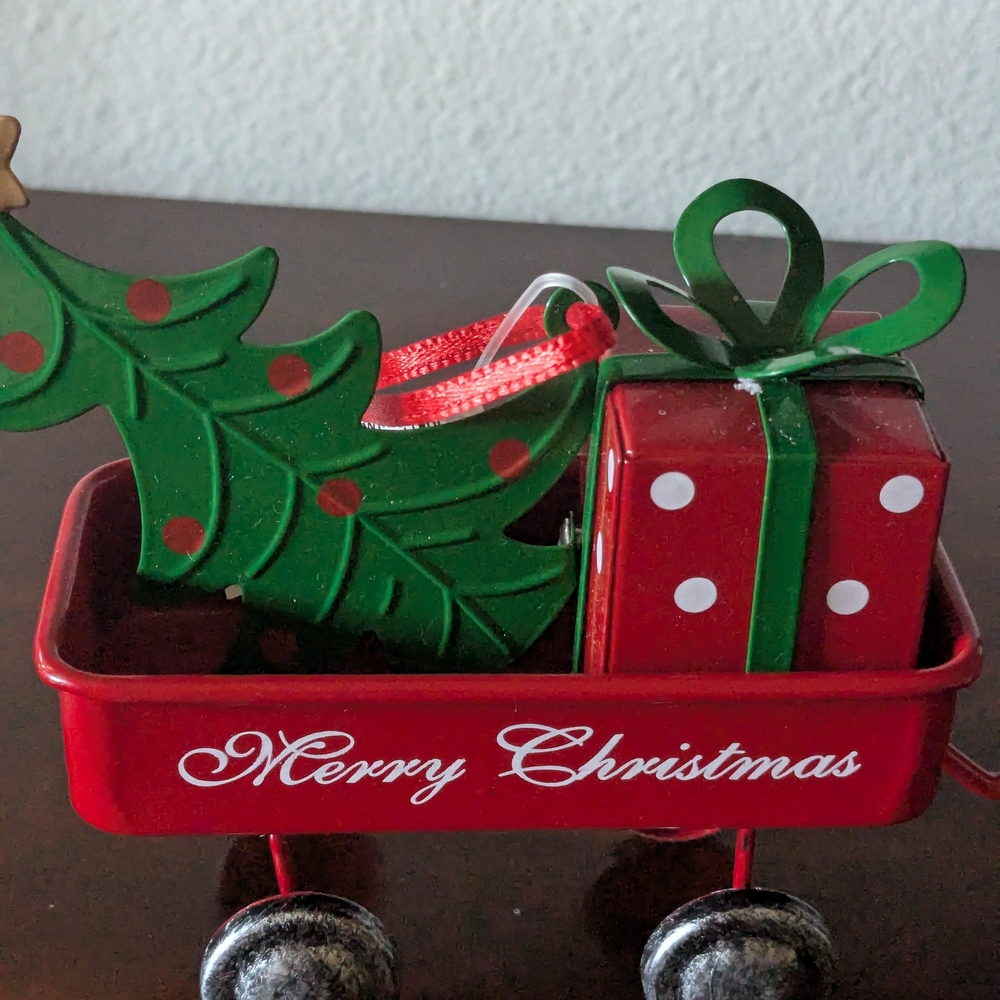 Festive Red Christmas Wagon with Green Tree and Gift